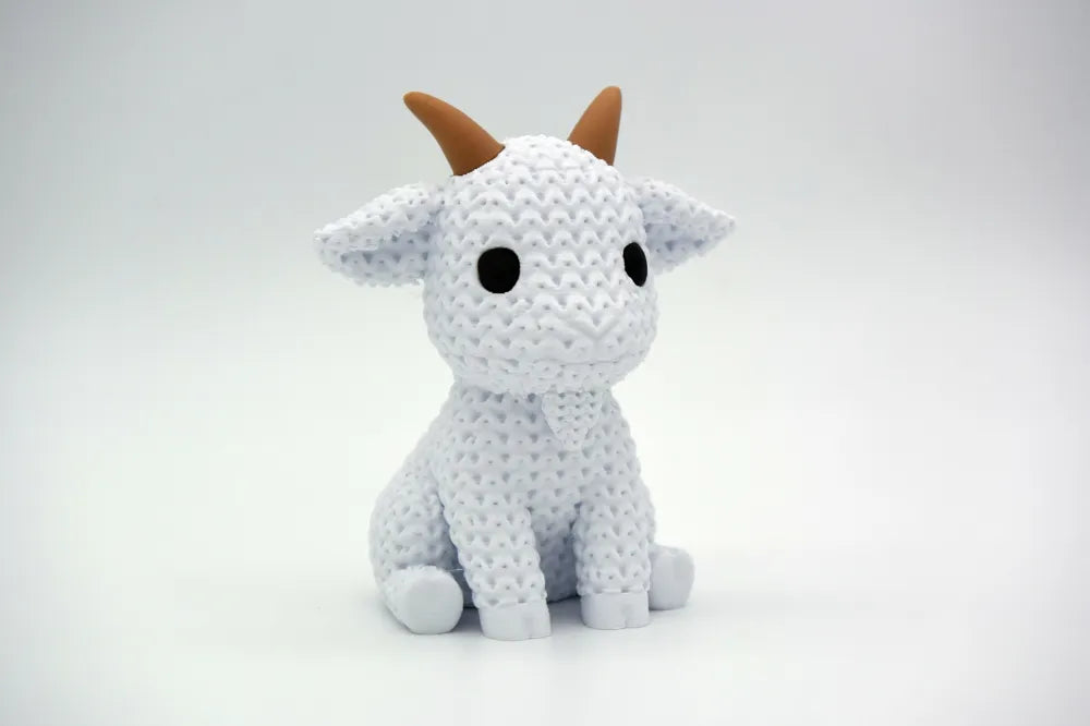 Chèvre mignonne blanche effet tricoté vue de côté, figurine imprimée en 3D - Tresor3D