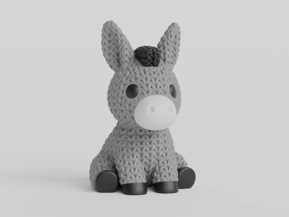 Figurine âne kawaii effet tricoté, détail de la texture tricotée