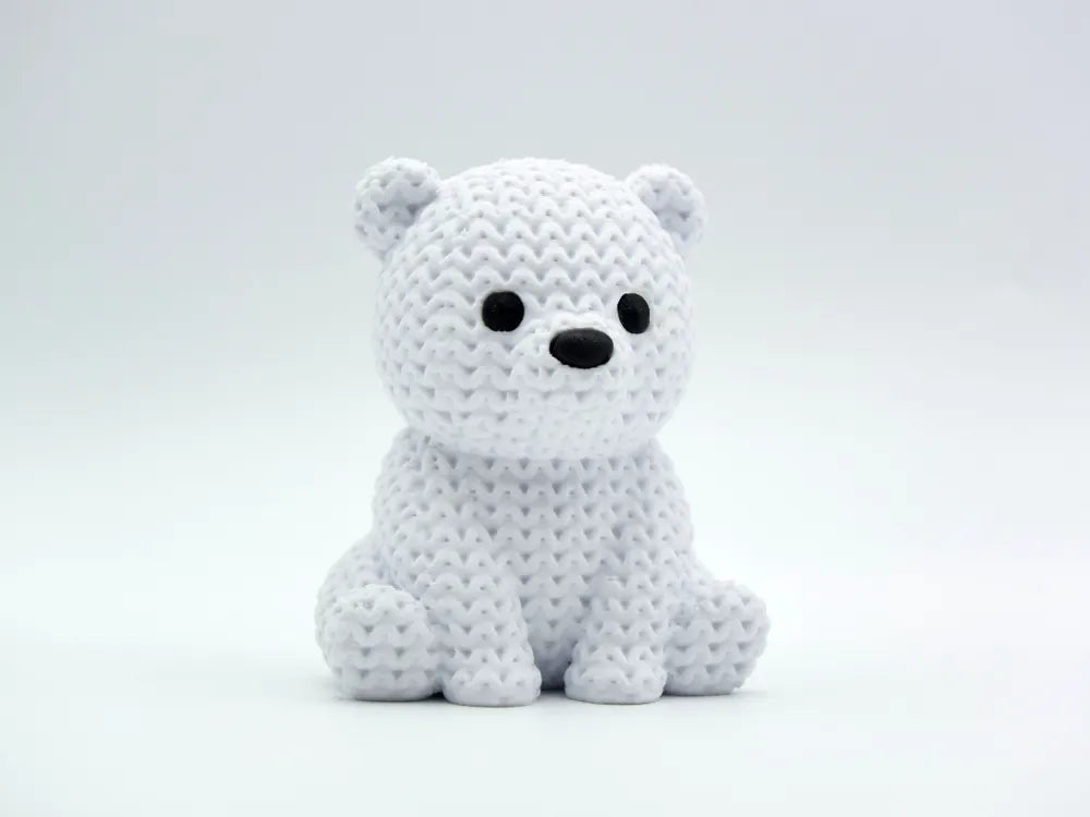 Figurine bébé ours polaire kawaii effet tricoté, vue de face