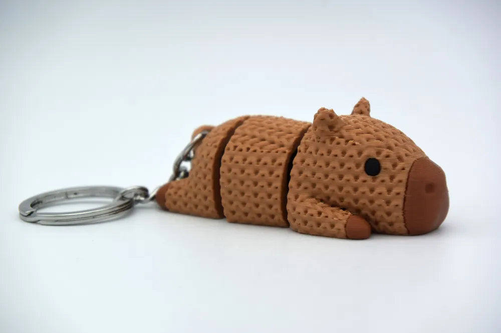 Figurine capybara articulé kawaii effet tricoté, vue de profil