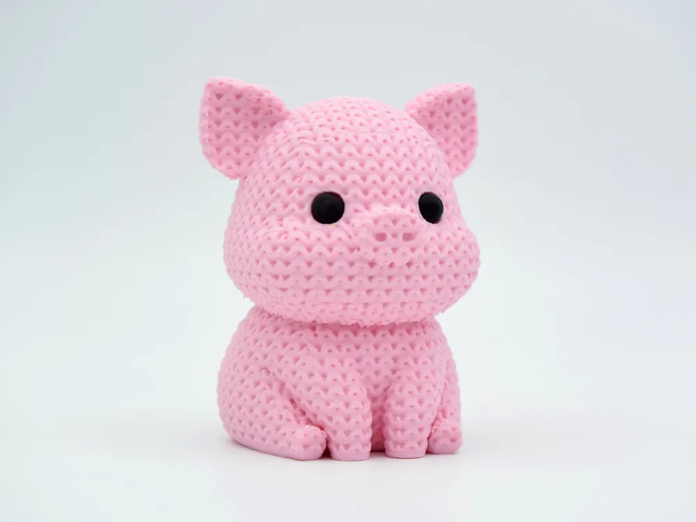 Figurine cochon kawaii effet tricoté, vue de profil