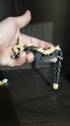 Dragon articulé tenu en main, maillons souples imprimés en 3D, Tresor3D
