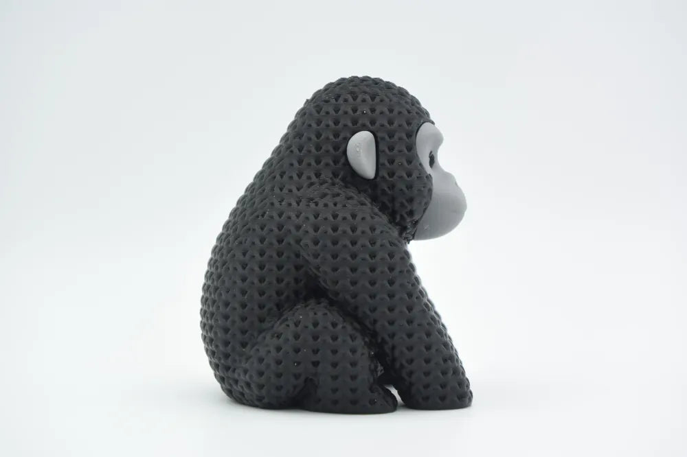 Figurine gorille kawaii effet tricoté, vue de profil