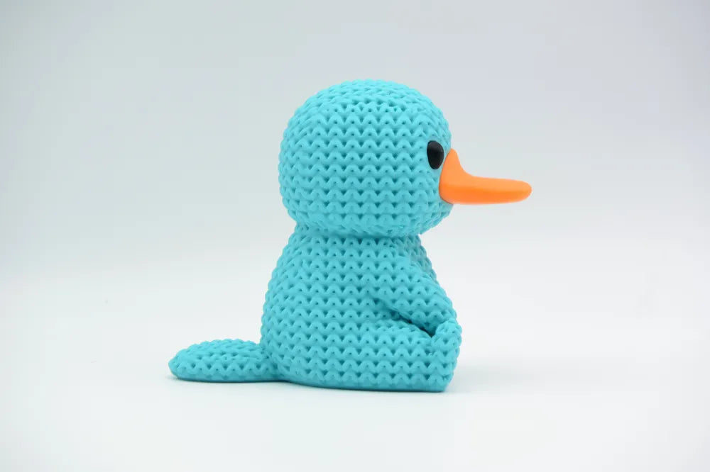 Figurine ornithorynque kawaii effet tricoté, vue de profil