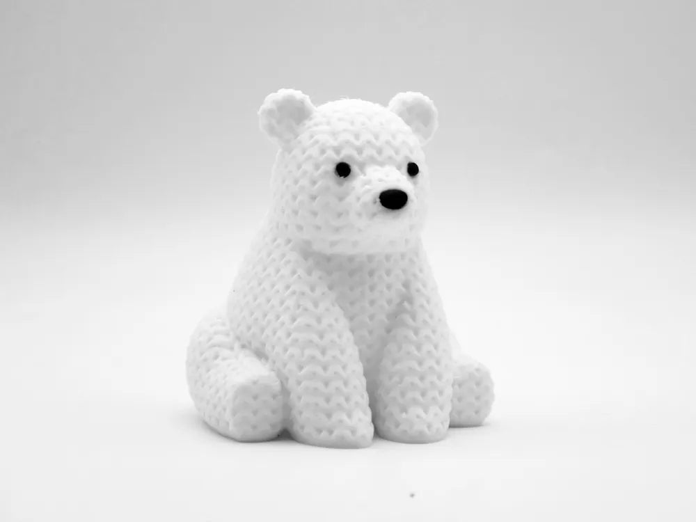 Figurine ourson polaire kawaii effet tricoté, vue de profil