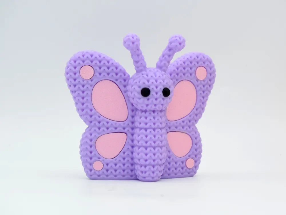 Figurine papillon kawaii effet tricoté, vue de profil