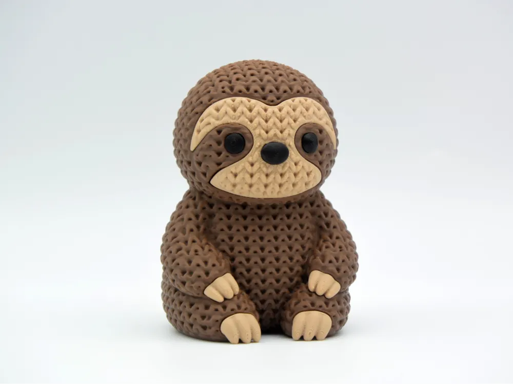 Figurine paresseux kawaii effet tricoté, vue de profil