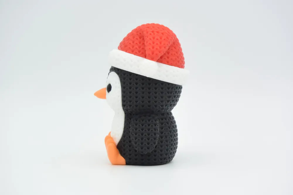 Figurine pingouin avec bonnet de noël kawaii effet tricoté, vue arrière