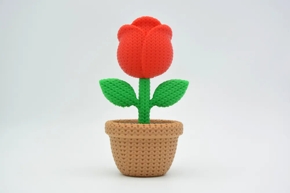 Figurine rose kawaii effet tricoté, vue de face