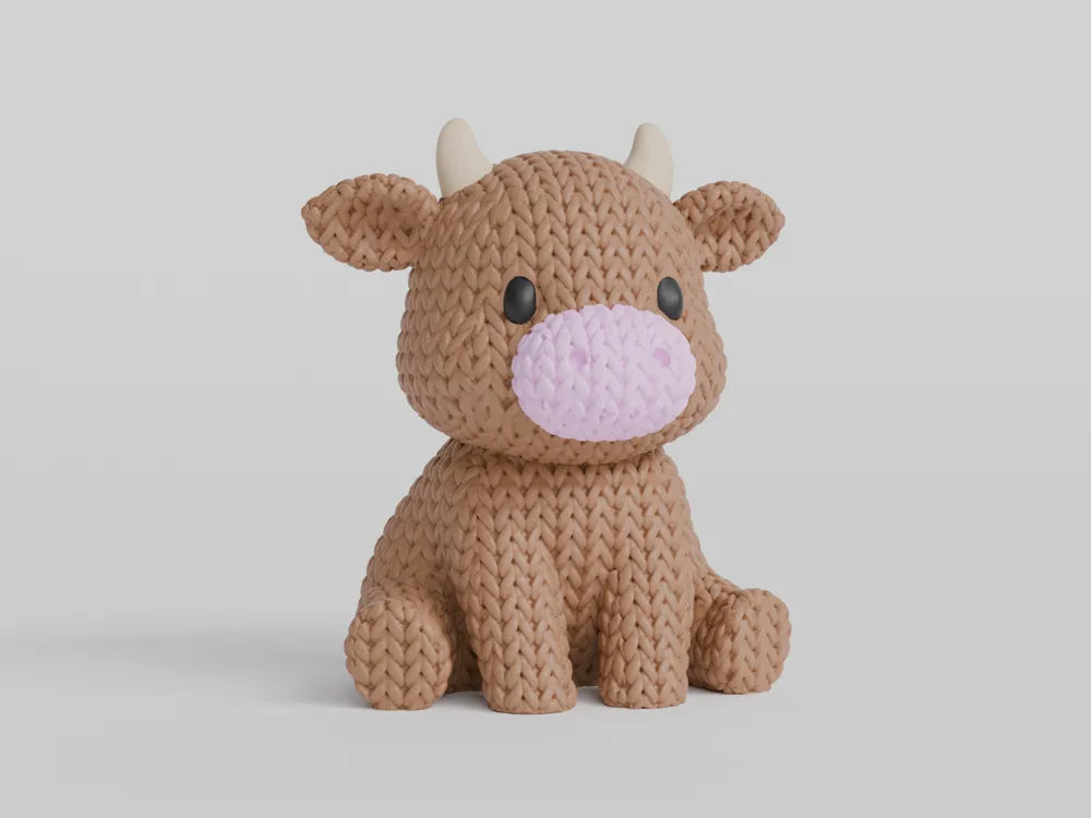 Figurine vache kawaii effet tricoté, vue de profil